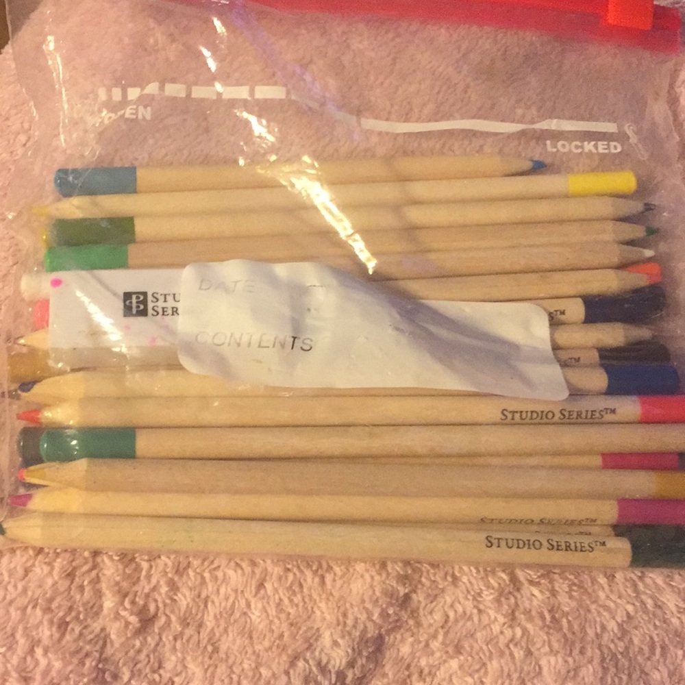 Lots of colored pencils with eraser they came with